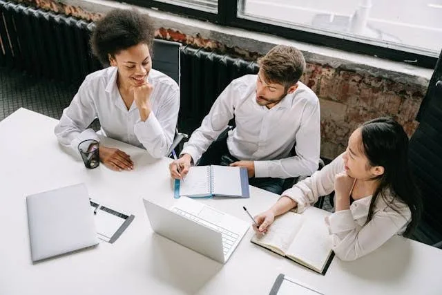 Financial consultant helping a family plan their Super Visa insurance budget and cash flow strategy.